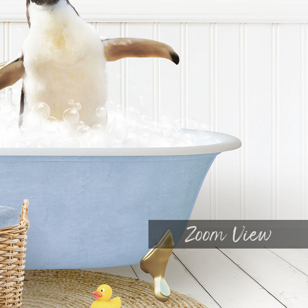 A penguin standing in a blue bathtub filled with bubbles, surrounded by rubber ducks and a basket.