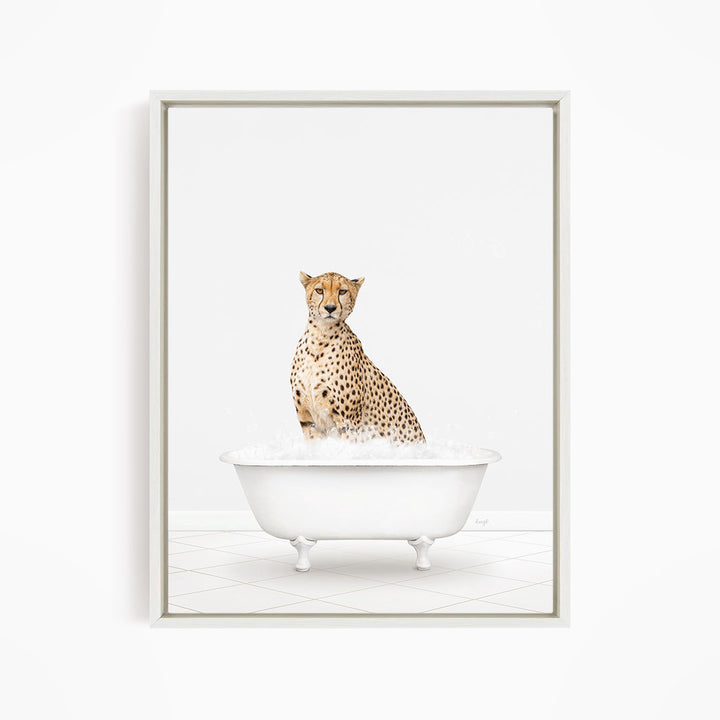 A cheetah sitting in a white bathtub filled with water.