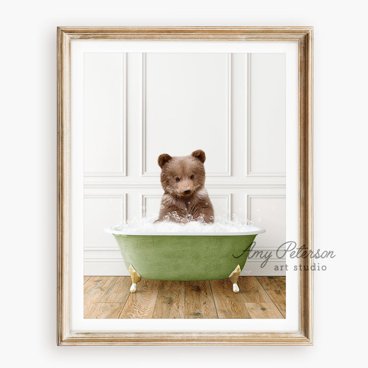 a brown teddy bear sitting in a green bath tub