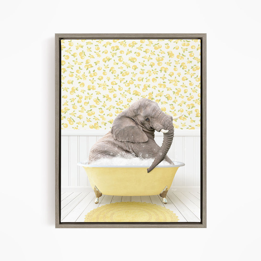 A gray elephant is sitting in a yellow bathtub filled with water, surrounded by a yellow floral pattern on the wall behind it.