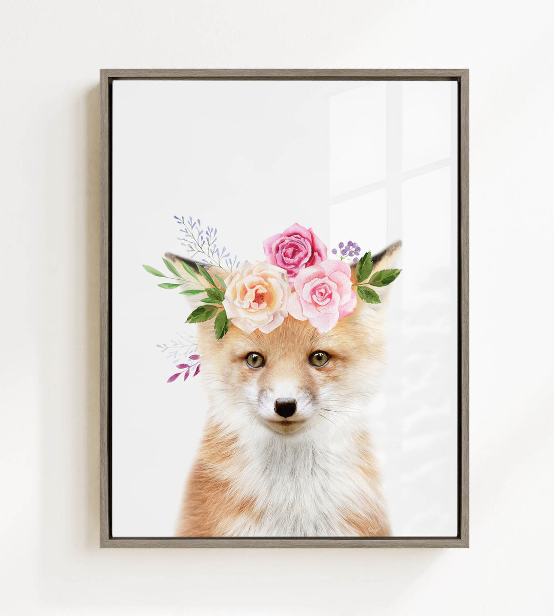 A fox wearing a floral crown of pink and white roses and green leaves.