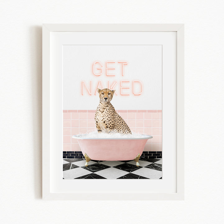 A cheetah sitting in a pink bathtub with the text "GET NAKED" displayed above it.