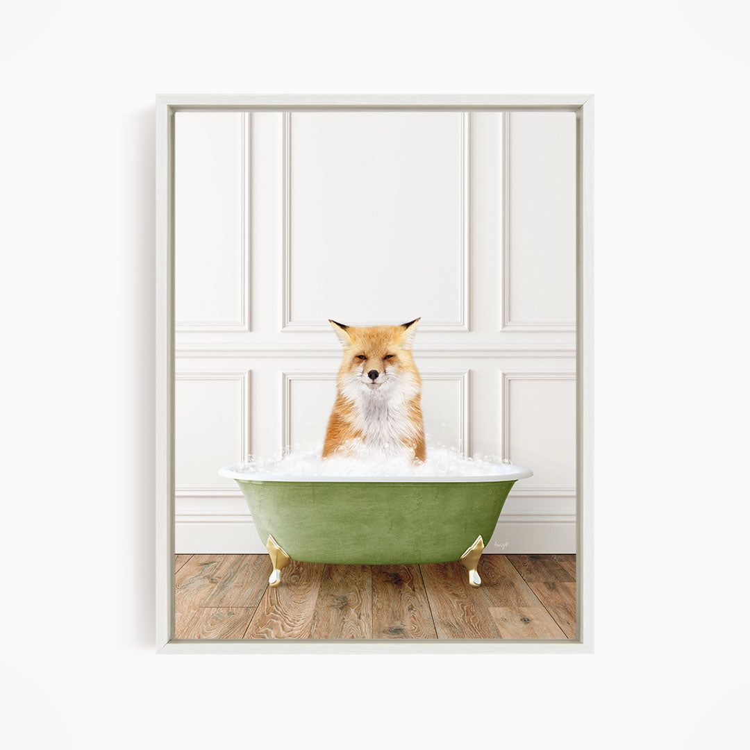 A red fox is sitting in a green bathtub filled with water, looking directly at the camera.