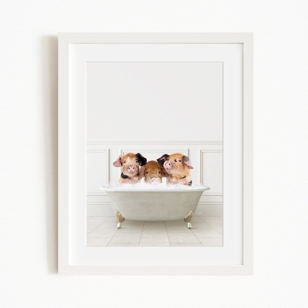 Three adorable pigs sitting in a white bathtub, enjoying a relaxing bath together.