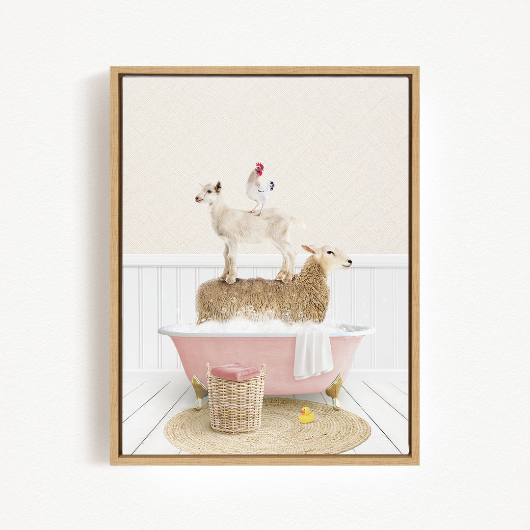 A framed image depicting a sheep standing on a pink bathtub, with a chicken perched on top, and a yellow rubber duck floating in the water.