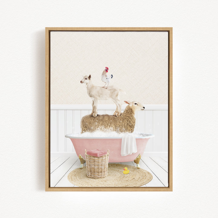 A framed image depicting a sheep standing on a pink bathtub, with a chicken perched on top, and a yellow rubber duck floating in the water.