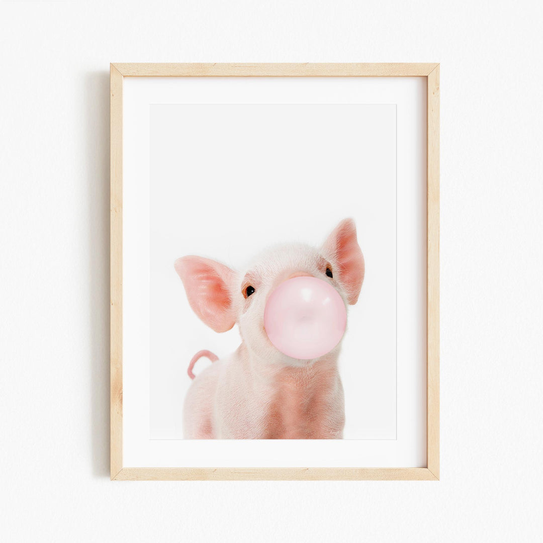 a picture of a pig blowing a bubble