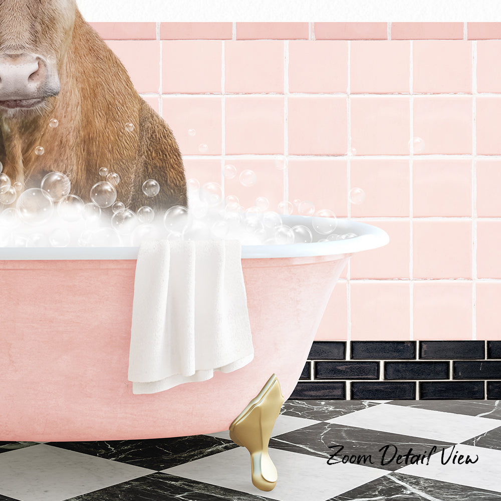 A brown dog is sitting in a pink bathtub filled with bubbles, with a towel hanging on the side and a pink tile wall in the background.