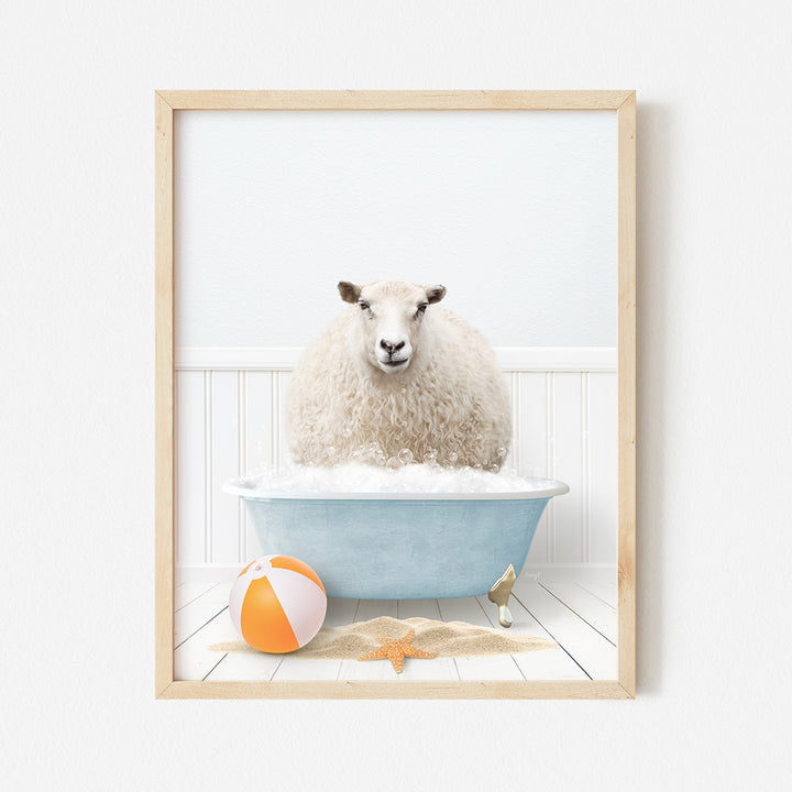 a sheep in a bathtub with a beach ball