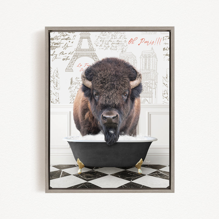 A buffalo with a long beard is sitting in a bathtub, with a checkered floor and a wall with the Eiffel Tower and other Parisian landmarks in the background.