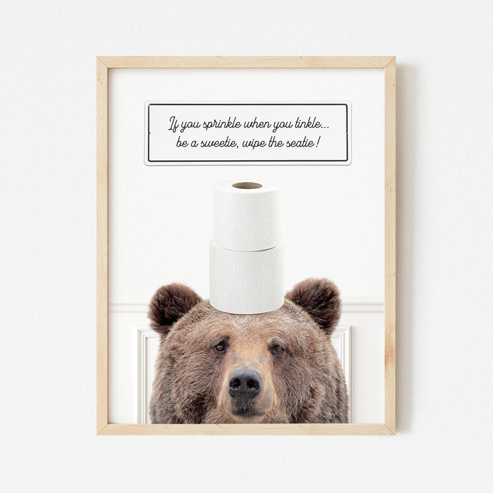 a picture of a bear with a roll of toilet paper on its head