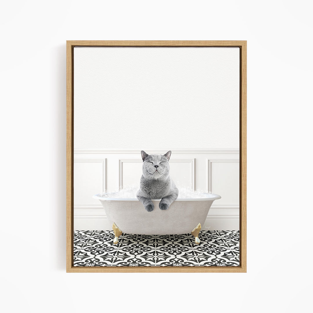 A gray cat sitting in a white bathtub filled with water, with a black and white patterned floor beneath it.