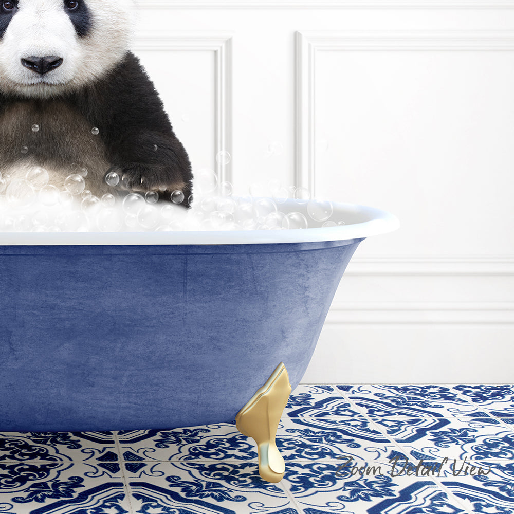 A panda bear sitting in a blue bathtub filled with bubbles, with a patterned tile floor in the background.