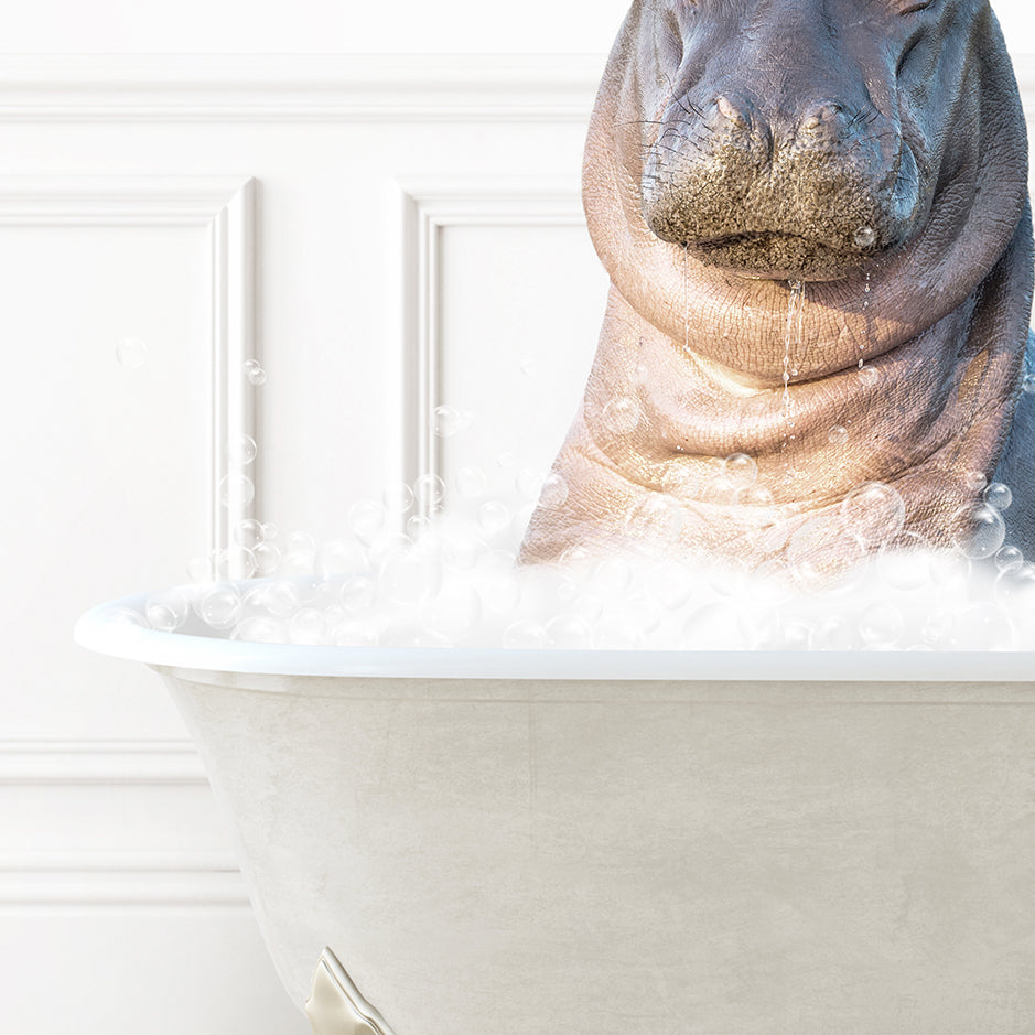 a hippopotamus sitting in a bathtub full of bubbles