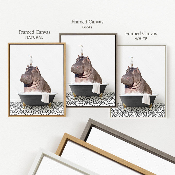 three framed pictures of a hippopotamus sitting in a bathtub, each with a different colored frame.