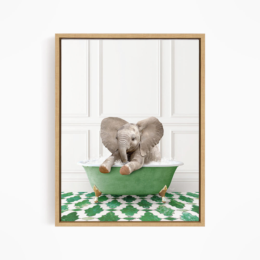 A baby elephant sitting in a green bathtub filled with water, surrounded by a green and white patterned floor.