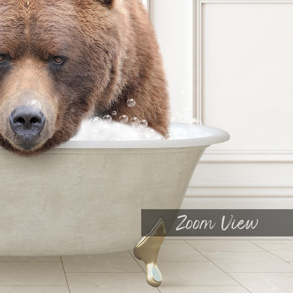A large brown bear is sitting in a bathtub filled with water, surrounded by bubbles.