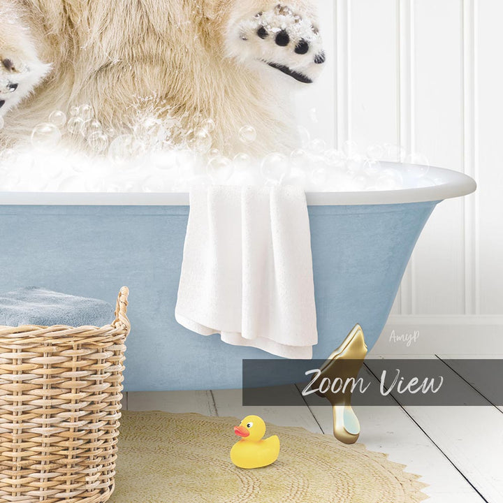 A fluffy white dog is sitting in a blue bathtub filled with bubbles, surrounded by a yellow rubber duck and a white towel.