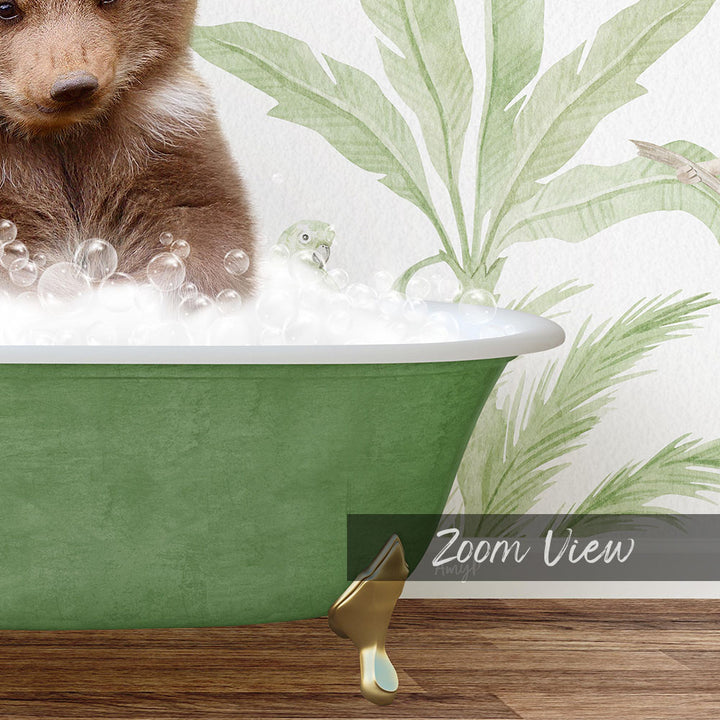 A brown bear is sitting in a green bathtub filled with bubbles, with a palm tree and bird in the background.