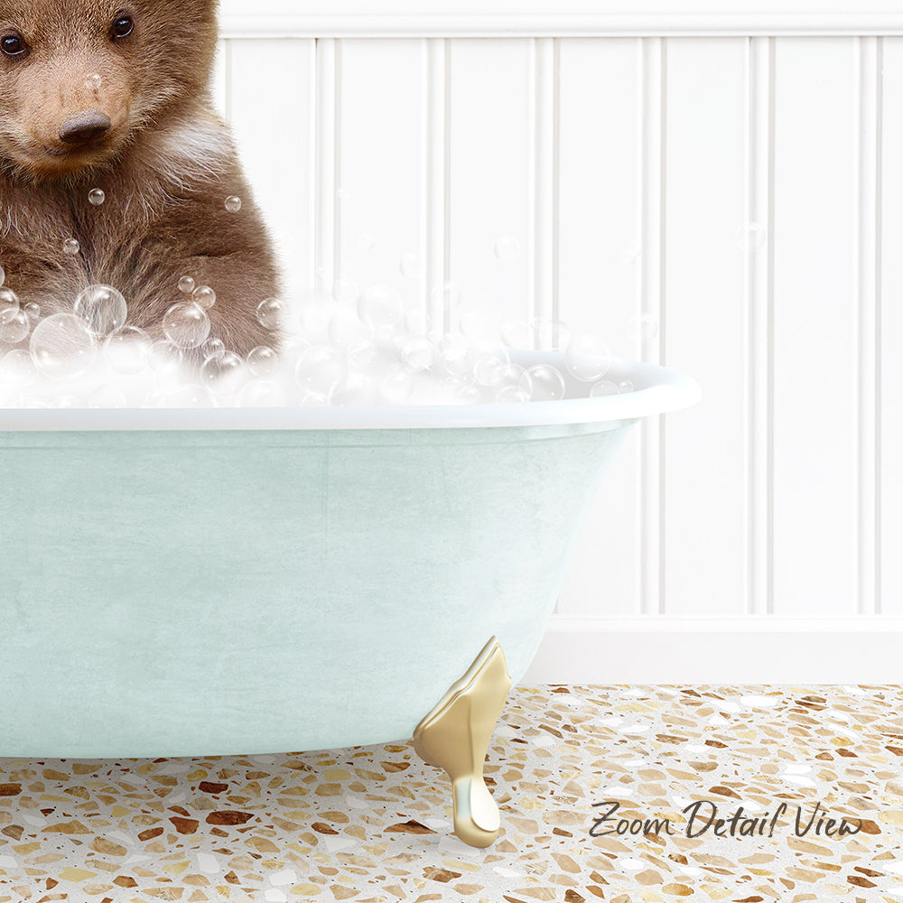 A cute brown bear sitting in a light blue bathtub filled with bubbles, with a white tiled floor and a text overlay that reads "Zoom Detail View".