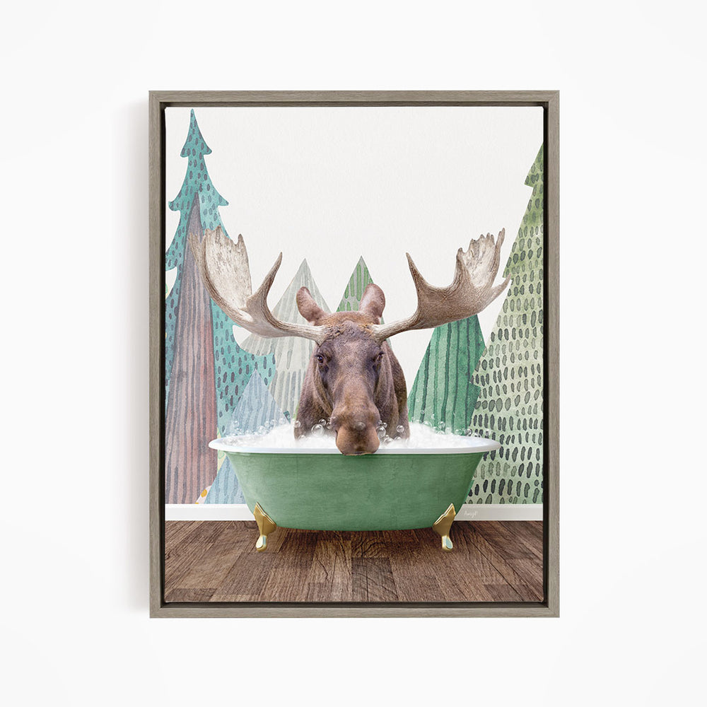 A moose with large antlers is sitting in a green bathtub, surrounded by a forest scene with trees and a snowy landscape.