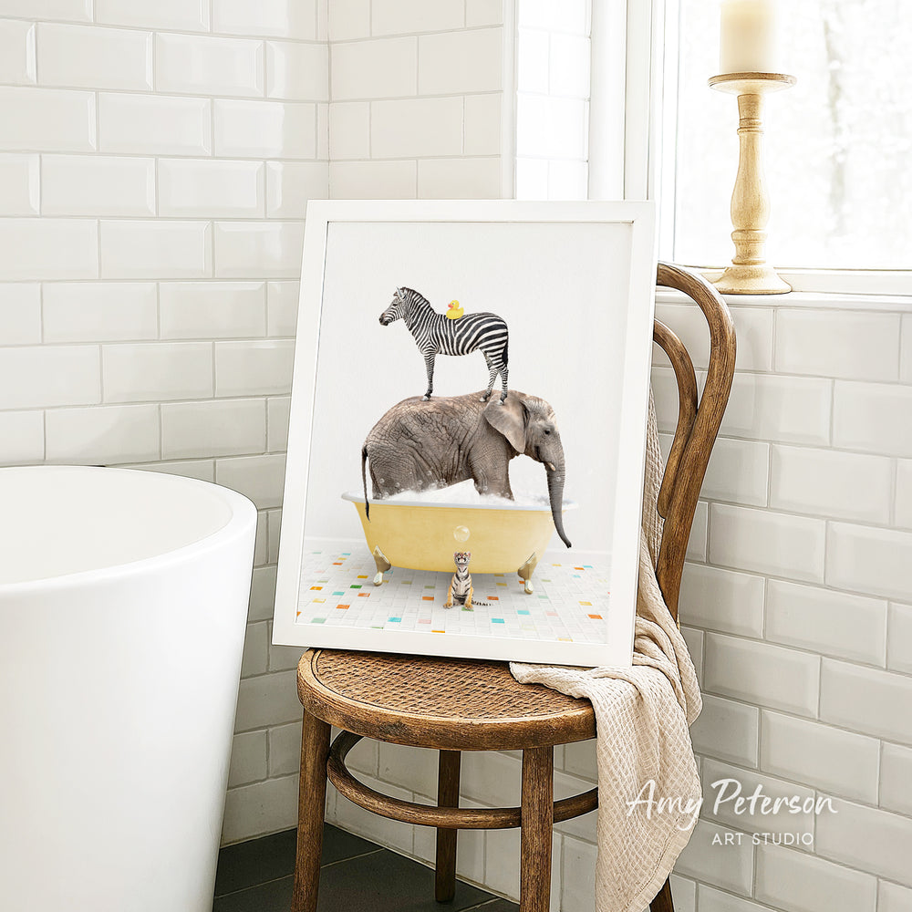 A framed image of a zebra standing on an elephant's back while both animals are in a yellow bathtub, surrounded by colorful tiles.