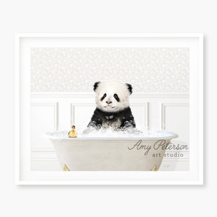 a panda bear sitting in a bath tub