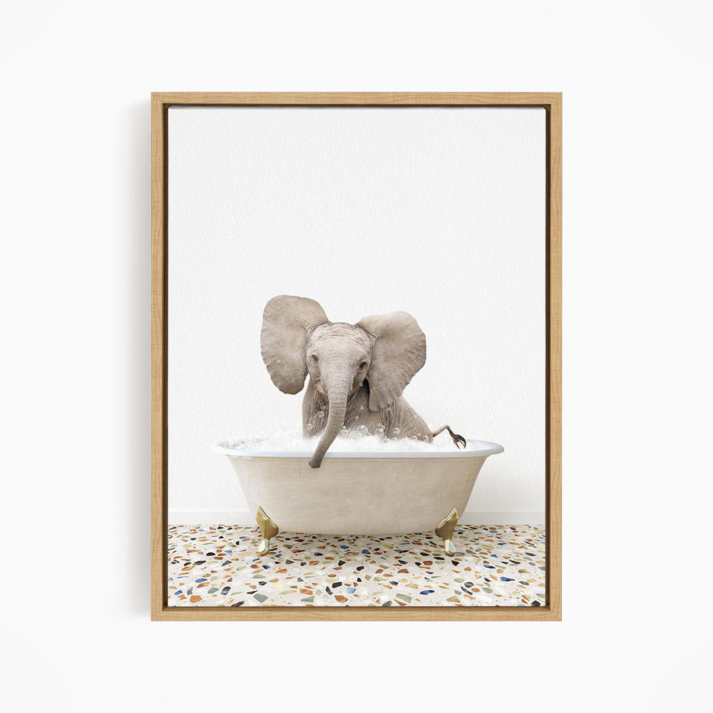 A baby elephant sitting in a bathtub filled with water, surrounded by a tiled floor.