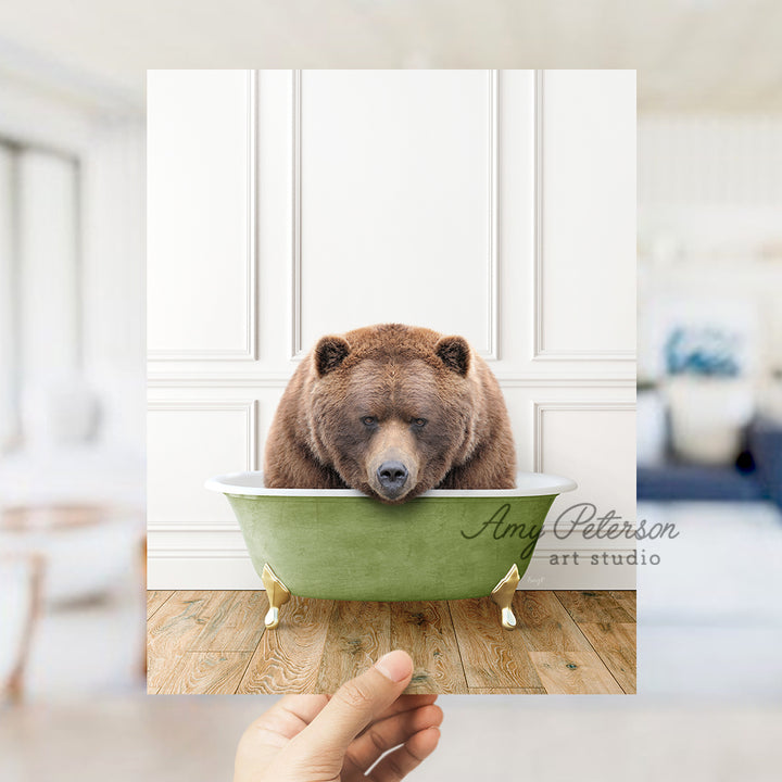 a bear is taking a bath in a green bathtub