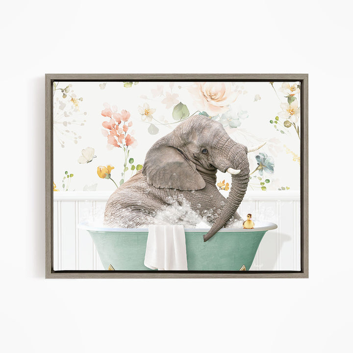 A gray elephant is sitting in a green bathtub, surrounded by a floral pattern.