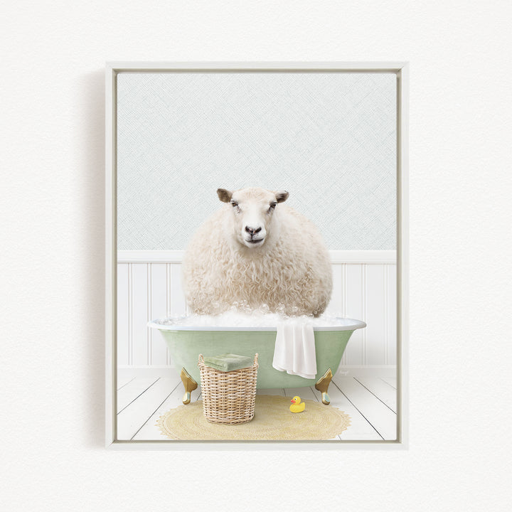 A fluffy white sheep sits in a green bathtub filled with bubbles, surrounded by a basket of bath toys and a yellow rubber duck.