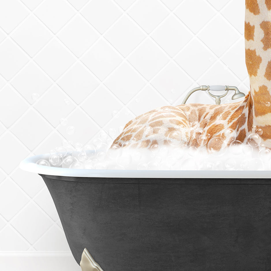 a giraffe laying down in a bath tub