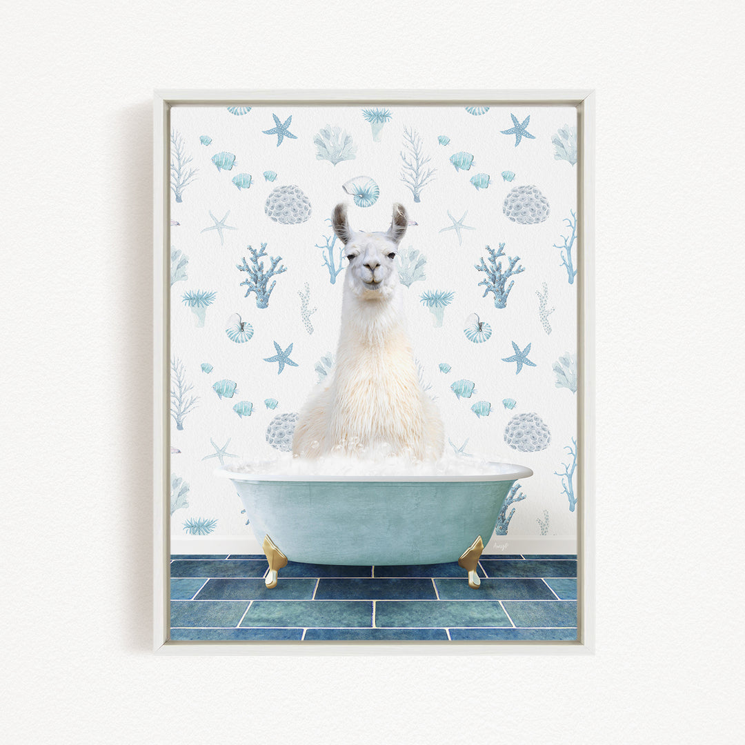 A white llama sitting in a blue bathtub filled with bubbles, surrounded by a pattern of blue and white seashells and starfish.