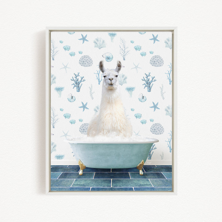 A white llama sitting in a blue bathtub filled with bubbles, surrounded by a pattern of blue and white seashells and starfish.
