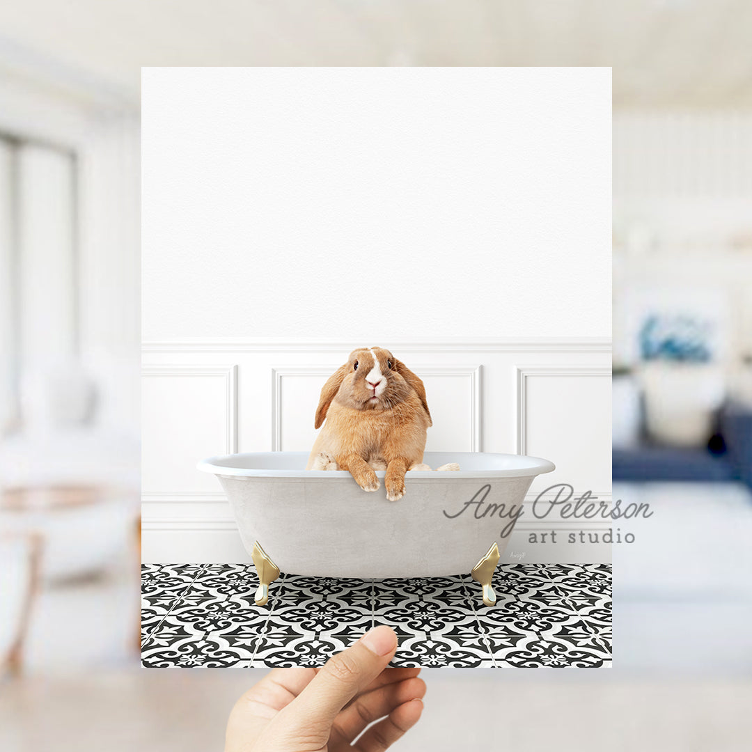 a person holding a card with a picture of a rabbit in a bathtub