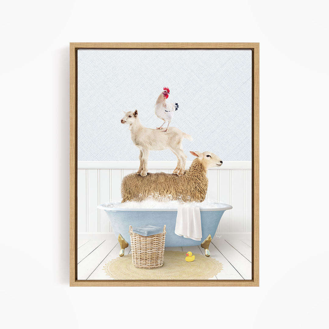 A framed image depicting a sheep standing on a bathtub, with a chicken perched on top, and a lamb sitting on the tub's edge.