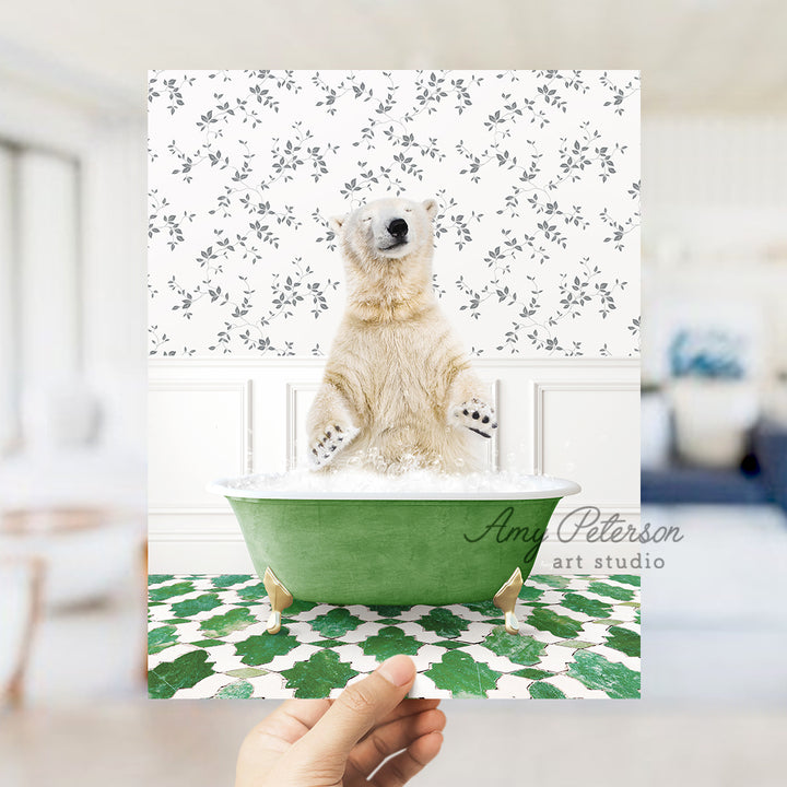 a polar bear sitting in a green bath tub