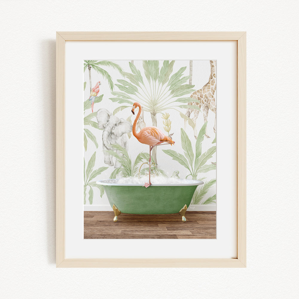A framed print depicting a pink flamingo standing in a green bathtub, surrounded by tropical foliage and a giraffe in the background.