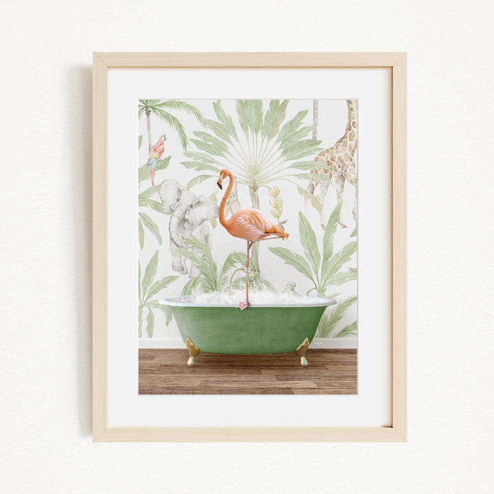 A framed print depicting a pink flamingo standing in a green bathtub, surrounded by tropical foliage and a giraffe in the background.