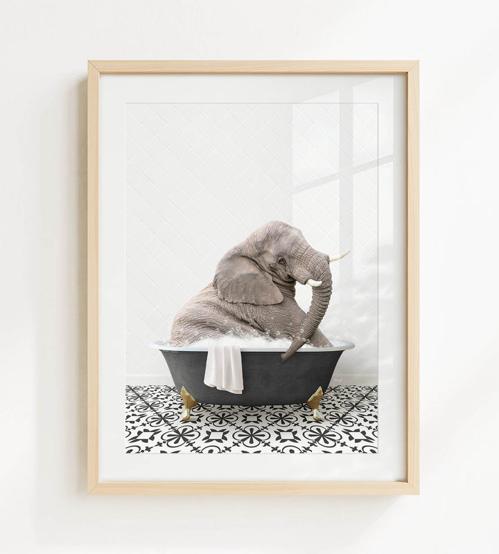 A gray elephant is sitting in a black bathtub filled with water, surrounded by a black and white patterned floor.
