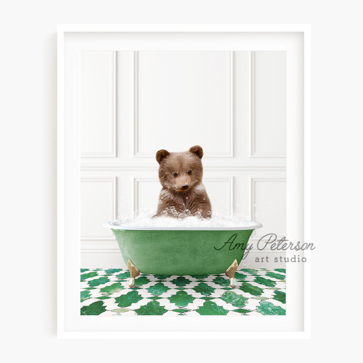 a brown teddy bear sitting in a green bath tub