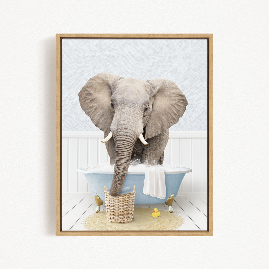 A gray elephant is standing in a blue bathtub filled with water, surrounded by rubber ducks.