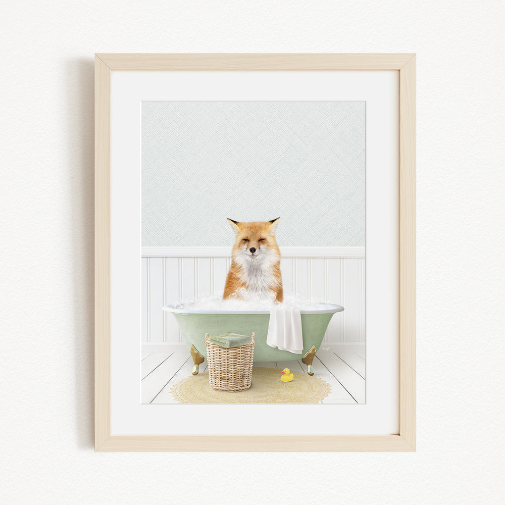 A red fox is sitting in a green bathtub filled with bubbles, surrounded by rubber ducks and a basket.
