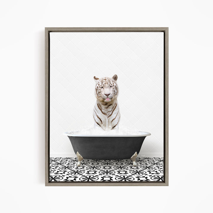 A white tiger sitting in a bathtub filled with water, surrounded by a black and white patterned floor.