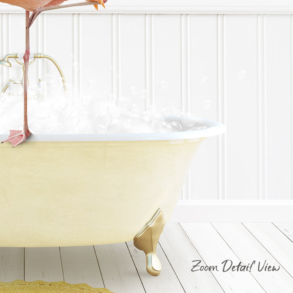 A white claw-foot bathtub filled with bubbles, with a pink flamingo perched on the edge.