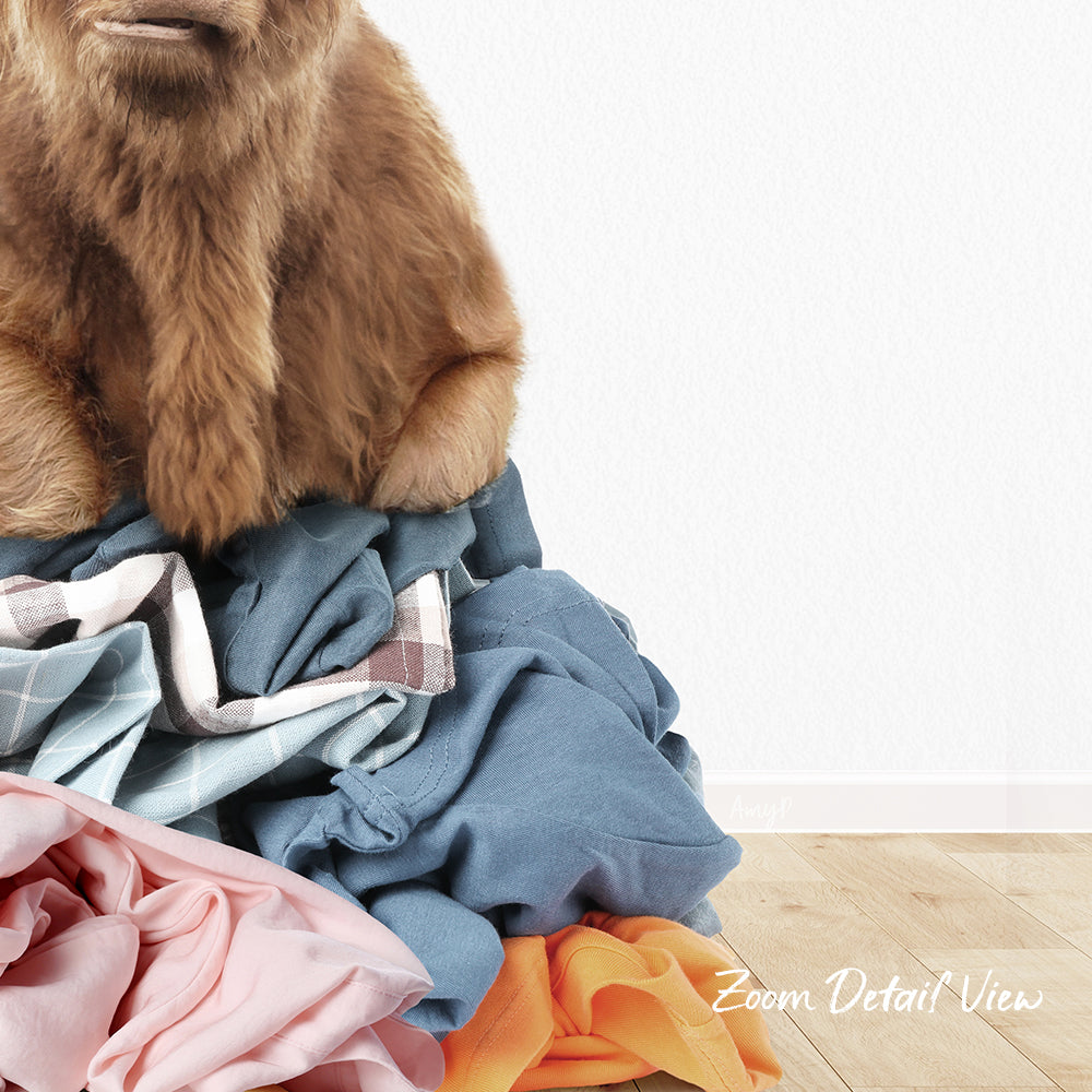 A pile of clothes, including a brown dog sitting on top of the pile, against a white background.