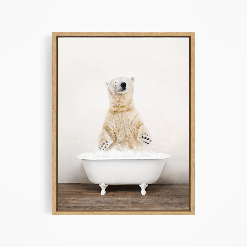 A polar bear standing in a white bathtub filled with water, with its paws raised in the air.