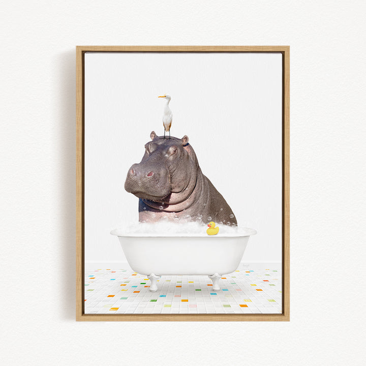 A framed image depicting a hippopotamus sitting in a bathtub, with a bird perched on its head.