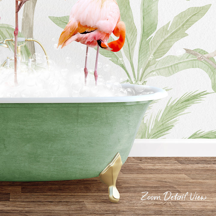 A pink flamingo standing in a green bathtub filled with bubbles, with a tropical plant wall behind it.