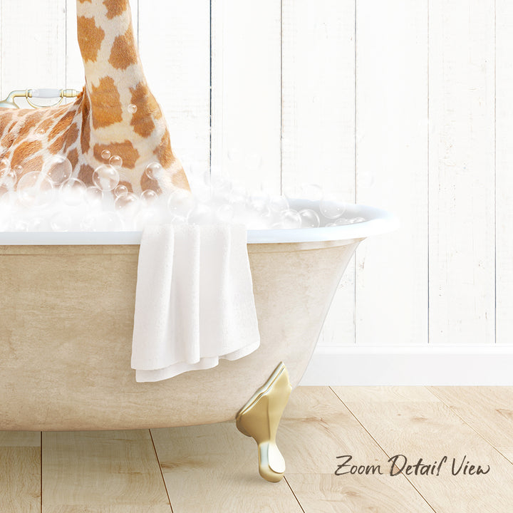A giraffe standing in a bathtub filled with bubbles, with a towel and gold bathtub leg visible.